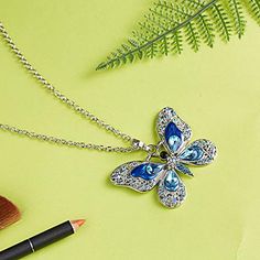 The Noble blue is combined with the butterfly, which symbolizes love and happiness, to make people more attractive Perfectly Match with Your Outfits,Be the Focus and the Star in Group by Wearing It - Available to Any Important Occasions:Party,Dating,Anniversary,Friends Gathering.Show the Most Beautiful You. Material:Alloy Metal and Rhinestone;Color:Blue Size(Approx):Overall Length 42 cm /16.53 inches,Extender Chain 5 cm /1.96 inches,Butterfly Size 4.1 cm x 5.7 cm /1.61 inches x 2.24 inches. You Dating Anniversary, Friends Gathering, Love And Happiness, Butterfly Pendant Necklace, Anniversary Dates, Butterfly Necklace, Butterfly Pendant, The Butterfly, Rhinestone Necklace