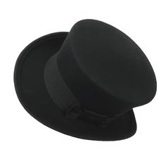 Woman top hat made with black wool felt in short crown and embellished with a 50 millimeters wide black grosgrain ribbon. Edwardian top hat ideal for everyday and special ocasions such as weddings, cocktails or parties. For man and woman. Measurements in centimeters are 32 x 27. Crown height 11. Brim length 6. These measurements may have some slight variation depending on the size of the hat. The end of the brim is reinforced inside with a fine wire covered with cotton thread to always have the Flat Brim Top Hat For Winter Party, Winter Party Top Hat With Flat Brim, Formal Black Brimmed Costume Hats And Headpieces, Classic Black Felt Hat With High Crown, Classic Black High Crown Felt Hat, Black Top Hat With Short Brim For Formal Occasions, Formal Black Brimmed Costume Hat, Black Formal Costume Hat With Curved Brim, Formal Black Costume Hats With Curved Brim