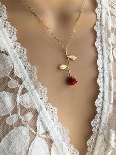 $17 - $34 · Original Red Rose Necklace, Beauty and the Beast Necklace,Anniversary Gift, Personalized Bridesmaid gift, Initial Necklace This dainty Long Stemmed Red Rose Necklace is plated in 24kt gold. Hand… Rose Jewelry For Valentine's Day, Elegant Rose Red Necklace For Mother's Day, Valentine's Day Gift Jewelry With Rose Design, Mother's Day Rose Design Necklace Gift, Red Flower Pendant Jewelry For Valentine's Day, Rose Flower Charm Necklace For Valentine's Day, Rose Gold Flower Charm Necklace For Valentine's Day, Rose Design Jewelry For Valentine's Day Gift, Rose Valentine's Day Necklace With Flower Charm