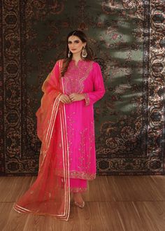 A brigh hot pink rawsilk long shirt minutely handworked with dabka, gota, sequence and zardozi, Paired with matching rawsilk worked Azar pants (Includes Shirt and pants) Latest Suit Styles, Suits Design Latest, Latest Suit Design, Cotton Suit Designs, Best Wedding Suits, Punjabi Suit Boutique, Salwar Kameez Online Shopping, Maharani Designer Boutique, Embroidery Suits Punjabi