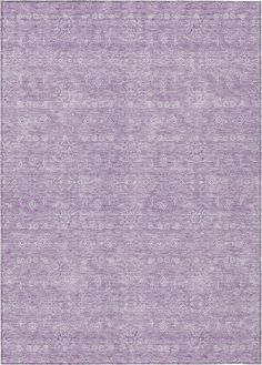 a purple rug with an intricate design on the top and bottom, it is very soft