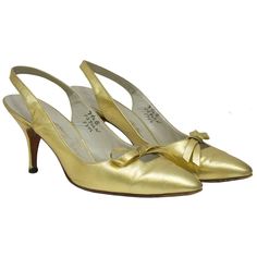 1950’s Roger Vivier gold leather pointed toe slingback heels. Shoe features a small cutout with a bow at the throat. Cream leather interior. Excellent vintage condition. Classic elegant style with moderate heel. Size US 7.5B Sole Length: 9.8" 1950 Shoes, Roger Vivier Sneakers, 1950s Shoes, Historical Shoes, Roger Vivier Shoes, Heels Brown, Pointy Toe Shoes, Life Styles, Cream Shoes