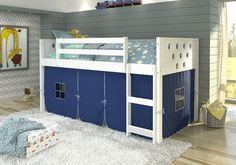 a blue and white bunk bed in a child's room with rugs on the floor