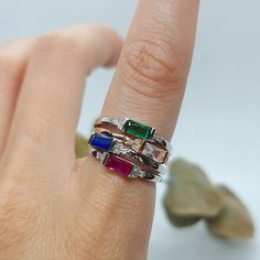 Colorful Baget Ring🌾 This ring is so elegant and perfect companion for other rings. You can mix the colors or just wear it alone for the perfect finishing.  Details:  ◇ Very elegant and simple  ◇ Useable as stapel ring  ◇ Nickel free  ◇ Hypoallergenic  All our pieces are 925 sterling silver and 14k gold plated. Follow us on instagram for more @dohmanstone  With love and magic, Dohmanstone Rose Gold Sterling Silver Open Band Ring, Stackable Emerald Cut White Gold Rings, White Gold Emerald Cut Stackable Rings, Emerald Cut Stackable Promise Rings, White Gold Sterling Silver Open Birthstone Ring, Stackable Rose Gold Diamond Ring In Sterling Silver, Silver Emerald Cut Stackable Rings Fine Jewelry, Sterling Silver Stackable Emerald Ring As Gift, Rose Gold Sterling Silver Stackable Solitaire Rings