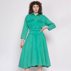 Vintage early 80s mint green corduroy midi dress in a western-inspired cut, with buttons up the front and back, a yoked waist, and a single pocket on the skirt. It has shoulder pads which can be easily removed with a seam ripper if desired. A few condition notes, see details below. Measurements and Condition: Fits like: Labeled size 4, women's small Fabric: Cotton corduroy Brand: d. Frank, made in USA Condition: Good, with light general wear, some fading at the front of the waist, some faint dar Fitted Corduroy Dresses For Spring, Collared Green Midi Dress For Fall, Green Collared Midi Dress For Fall, Vintage Green Midi Dress For Fall, Green Vintage Midi Dress For Fall, Fitted Green Shirt Dress With Pockets, Vintage Midi Dress With Pockets, Spring Corduroy Dress For Workwear, Green Cotton Shirt Dress With Pockets