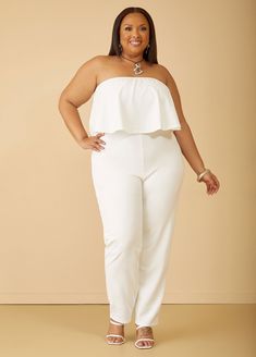 With its strapless design & flounced neckline, this jumpsuit exudes elegance and femininity. The slim leg silhouette offers a flattering fit, elongating the legs for a sleek and sophisticated look. Chic Strapless Summer Pantsuit, Elegant Bandeau Jumpsuits And Rompers For Spring, Elegant Spring Bandeau Jumpsuits And Rompers, Chic Solid Color Bandeau Strapless Jumpsuit, Chic Bandeau Strapless Jumpsuit, Elegant Bandeau Strapless Jumpsuit, Elegant Stretch Strapless Jumpsuit For Summer, Elegant Stretch Strapless Jumpsuit, Chic Strapless Stretch Jumpsuits And Rompers