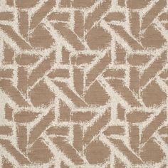 a brown and white rug with an abstract design