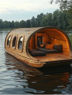 a wooden boat floating on top of a body of water