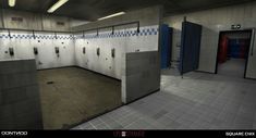 an empty public bathroom with blue and white tiles on the walls, and urinals