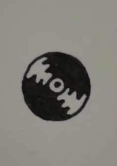 a black and white photo with the word mom written in it's center circle