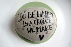 a rock that says to be happy is a choice we make