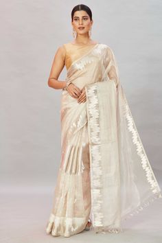 Shop stunning cream zari work tissue Banarasi saree online in USA. Look your best on festive occasions in latest designer sarees, pure silk sarees, Kanjivaram silk saris, handwoven saris, tussar silk sarees, embroidered saris from Pure Elegance Indian clothing store in USA.-full view Banarasi Sari, Tussar Silk Sarees, Indian Clothing Store, Latest Designer Sarees, Fashion Journals, Tussar Silk Saree, Banarasi Saree, Zari Work, Indian Clothing