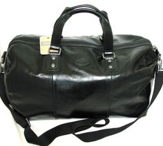 100% AUTHENTIC FOSSIL BLACK LEATHER + CANVAS TRANSIT DUFFLE BAG,TRAVEL LUGGAGE BRAND NEW with TAG! Approximate Dimensions: 14"H x 22"L x 10"W Black leather/canvas double handles 7" Black canvas detachable cross body 16"-26" EXTERIOR This beautiful bag is made of black leather Polished silver tone hardware + large zipper pulls Top zip closure Five studs/stands on bottom for balance Fossil leather logo plate on front Full size zipper pocket on back Comes with Authentic Fossil key chain INTERIOR Bl Luggage Brands, Front Wall, Duffle Bag Travel, Diet Pills, Leather Logo, Black Nylon, Bag Travel, Black Canvas, Black Nylons