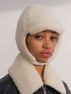 Editor's Notes Shearing wool blend aviator style hat in ivory.- Wool blend fabric- Ear flaps with adjustable fastening- Adjustable chin strapMeasurements(in.)One size- Height: 13.39 in.- Width: 14.17 in.Composition & Care- Outshell : Acrylic 50% Wool 25% Polyester 25% Lining : Cotton 100%- Dry clean onlyDesigner- by TRUNK PROJECT Trapper Hat Men, Aviator Hat, Trapper Hat, Trapper Hats, Hat Men, Aviator Style, Cool Hats, Face Drawing, Hat Fashion