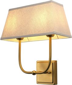 a wall light with a white shade on the side and a gold metal frame around it