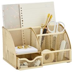 a desk organizer with pens, pencils and other office supplies in gold metal mesh