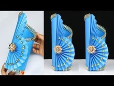 two pictures of different types of blue and gold folding paper fans with jewels on them