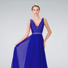 The Elegant Dress Made Of Chiffon Has An Illusion Plunging V-Neckline, Which Together With A Rhinestone-Decorated Waistline Makes The Image Unique, While An Inconspicuous Zipper On The Back Will Ensure A Secure Fixation Of The Dress On Your Important Day. Fabric: Chiffon Length: Long Colour: Navy Neckline: Illusion Plunging V-Neck Silhouette: A-Line Sleeve: Sleeveless Back: Zipper Embellishments: Rhinestones Occasion: Romantic Date/Evening/Dinner, Wedding/Bridesmaid, Graduation, Fashion Show, Vi Blue Chiffon Evening Dress For Gala, Elegant Blue Sleeveless Chiffon Dress, Blue Sleeveless Chiffon Dress For Wedding, Blue Sleeveless Chiffon Formal Dress, Blue Sleeveless Chiffon Prom Dress, Blue Sleeveless Chiffon Dress, Blue Chiffon V-neck Dress For Prom, Evening A-line Pleated Sleeveless Dress, Blue V-neck Chiffon Prom Dress