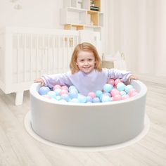 Discover the joy of playtime with our upgraded ball pit for toddlers, a larger, interactive space filled with 500 ocean balls (not included) to stimulate cognitive and motor skills. Designed with your child's safety and comfort in mind, it features high-grade memory foam and a skin-friendly cover for a soft, secure play area. Cleaning is easy with a detachable, machine-washable cover. Watch it expand from its vacuum-sealed package to its perfect circular shape within 1-3 days. The ideal gift for Foam Ball Pit, Ball Pit For Toddlers, Kids Ball Pit, Baby Ball Pit, Ball Pits, Ball Pit Balls, Baby Playpen, Baby Ball, Ball Pool