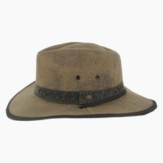 'The Buckthorn is well suited to the adventurous soul who craves a rugged hat for outdoor exploring. Made of waxed cotton that repels moisture, the Buckthorn is an outback safari style that features a vented modified teardrop crown for air flow. Trimmed with a faux leather hat band and matching brim edging, this sturdy hat will stay in place with its adjustable chin strap. Lightweight and pliable, the wide brim offer a hidden wire along the edge that can be hand shaped to meet your needs. *Exclu Rugged Hunting Hat With Curved Brim, Rugged Flat Brim Hunting Hat, Vintage Outdoor Hat For Fall, Vintage Hats For Outdoor Fall Use, Vintage Fall Hat For Outdoor, Rugged Brown Hunting Hat, Rustic Outdoor Hats For Fall, Classic Outdoor Waxed Finish Hats, Cotton Hats For Outdoor Fall Activities