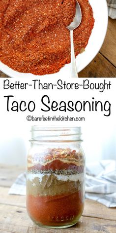 a jar filled with taco seasoning on top of a wooden table next to a spoon