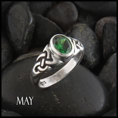 Celtic Knot Birthstone Ring, Silver Celtic Gemstone Ring, Birthstone Ring Classic May Birthstone Ring With Accent Stones, Oval May Birthstone Ring Gift, May Birthstone Ring For Gift, Classic Oval Cabochon Birthstone Ring, Oval May Birthstone Promise Ring, Hallmarked Sterling Silver Ring For May Birthstone, May Birthstone Ring In Sterling Silver With Bezel Setting, Sterling Silver Birthstone Ring For May, Oval May Birthstone Ring For Promise