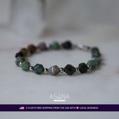 Handcrafted from authentic Indian Agate, every bead showcases distinctive patterns and natural earthy hues, enhanced by a faceted cut that delicately captures and reflects light, exuding understated sophistication. With its adjustable length, this bracelet ensures a snug and comfortable fit, while the stainless steel lobster clasp guarantees durability and longevity.

Strength ♥ Grounding ♥ Stability ♥ Balance ♥ Intuition











 

 	Crystal: Natural Indian Agate
 	Type: Adjustable Beaded
 	Bead Size: 7 MM
 	Bracelet Size: 7.5 Inches + 1 inch
 	Wrist Size Range: 6.2 to 8.2
 	Bead Shape: Faceted
 	Closure: Lobster Clasp
 	Other Materials: Stainless Steel Beaded Bead, Earthy Hues, Indian Agate, Bracelet Diamond, Cleansing Crystals, Energy Bracelets, Healing Crystal Jewelry, Authentic Indian, Agate Bracelet