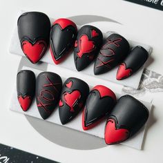 Welcome to LD Nails!  Hi, I'm Bur and I'll be your long distance nail ghoul 😜 Read on for the obligatory written description of what you see in the pictures, plus some other important stuff..  🖤 One set of 10 REUSABLE Press On Nails 🖤     🖤 Made to order in your shape & size 🖤  ♥️ Queen Of Hearts: red and black gothic hearts Valentine's Day press on nails. This set is THERMAL!! Black when cold, and white when your hands warm up!  *These are meant to be matte (your choice of velvet or satin) with 3D Black detailing. If you request a glossy set the 3D effect will be lost. Consider requesting white details if you want a glossy finish.  👉 Please leave your finish preference and (if applicable) custom sizing in the personalization box!  Purchase INCLUDES an application kit! It consists of Dark Valentine’s Day Nails, Short Valentines Nails Black, Queen Of Heart Nails Designs, Gothic Valentines Day Nails, Nail Art Planner, Goth Valentine Nails, Red And Black Chrome Nails, Valentine's Nail Art, Dark Valentine Nails