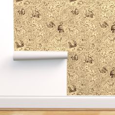 the wall paper has animals on it