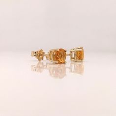 These round citrine gemstones shine brightly, especially in sunlight! Their vibrant orange color looks beautiful paired with solid gold. These studs are currently priced with solid 14k gold and natural, earth-mined gemstones. 14k Gold Orange Jewelry With Prong Setting, Citrine Gemstone Jewelry With Round Cut, Round Citrine Jewelry With Stones, Orange Citrine Jewelry With Prong Setting, Orange Citrine Round Jewelry, Round Yellow Citrine Gemstones, Citrine Earrings Studs, Designer Silver Jewellery, Solitaire Studs