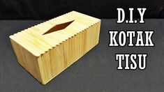 a wooden box with the words diy kotak tisu written on it