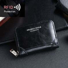 Hign-concerned Chemical : None Material Composition : 1 Main Material : Denim Gender : WOMEN 100% Brand new and high quality.Type:Card HolderMaterial: PU LeatherSize: 10.5*2.5*7.5cmColor:As Picture Shown Package includes:1 x Card HolderNote:1. Please allow 1-2cm error due to manual measurement.2. Due to the difference between different monitors, the picture may not reflect the actual colour of the item. Please understand this. WHAT ABOUT REFUND?   Fast refund,100% Money Back Guarantee. If your product is defective or doesnt work properly, let us know and well send you a replacement one. We believe in our products so much that we offer a 30-day No-Hassle refund policy. If youre unhappy about your purchase, send us the product back and well refund your money immediately. Black Card Holder With Zipper Closure As Gift, Classic Black Coin Purse With Rfid Blocking, Black Business Card Holder With Zipper Closure, Black Business Card Holder With Zipper, Casual Black Card Holder With Interior Slots, Casual Black Card Holder, Black Wallet With Zipper Closure As Gift, Black Wallets With Zipper Closure As Gift, Trendy Black Card Holder With Card Slots