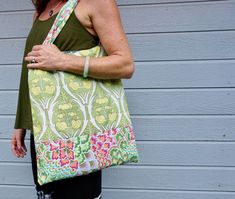 "Handmade bag using all Amy Butler fabrics. Sturdy, yet soft purse, has a zippered pouch on the inside. Size approx 17\" tall by 14\" wide. Handles approx 23\" long by 1.5\" wide. Zippered pouch is approx 8\" tall by 9.5\" wide. Beautiful and unique, one of a kind purse I will not be re-creating! Machine wash ok, only on cold wash. Do not bleach. Air dry only." Green Rectangular Hobo Bag With Zipper Pocket, Tulip Bag, Amy Butler Fabric, Kailua Kona, Amy Butler, Zippered Pouch, Handmade Bag, May 21, Handmade Bags