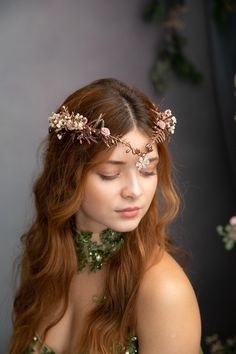 Flower elven tiara :) The flower tiara is made of preserved and artificial flowers, grass, and other arranging material. Dress: Chotronette  https://chotronette.com/shop/sweet-ivy/ When stored in dry and dark place, our products last 10-15 years. We can also make you other matching accessories. Please message me for more information. :) ---------------------------------------------------------------- SHIPPING INFO FOR EU ORDERS: Standard shipping: Your package will arrive in about 5-8 days after Floral Fairy Wedding Crown, Real Flower Wedding Crown, Luxury Whimsical Headpieces For Garden Party, Leafy Wedding Crown, Middle Earth Wedding Tiara, Boho Bride With Flower Crown, Flower Headpiece Floral Crowns, Luxury Floral Headpieces For Evening, Luxury Floral Headpieces For Spring