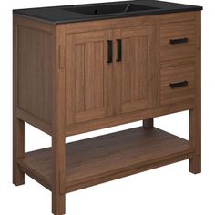 a bathroom vanity with black counter top and wooden cabinet drawers on one side, under a white background