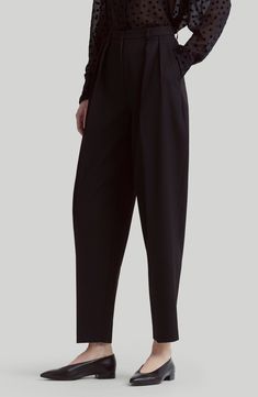 Tailored from Italian-woven virgin wool, these tapered-leg pants feature reversed front pleats that create a relaxed fit. 27" inseam; 15" leg opening; 12 1/2" front rise; 16" back rise (size 42FR) Zip fly with hook-and-bar closure Front slant pockets; back button-welt pockets 100% virgin wool Dry clean Made in Italy Designer Clothing Leg Pants, Nordstrom Store, Free Fabric, Anniversary Sale, Fabric Gifts, Tapered Legs, Clothing Items, Nordstrom, Relaxed Fit