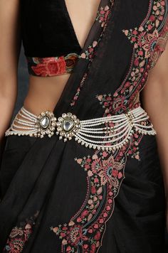 Elegance of timeless polki combined with high grade shell pearls. This statement waist belt is a show stealer for sure. Wear this with your lehenga skirts or traditional sarees if standing out is your thing. Free size - Adjustable STYLE TIP - This one is for effortless styling with your traditional wear. Team this with your choicest of Indo western dresses or ruffle sarees. Handcrafted in Jammu and Kashmir. Paisley Pop travels the depths of India to learn techniques and crafts from deep down the Indian Waist Belt, Waist Chain Indian, Kundan Design, Belts Design, Lehenga Skirts, Indo Western Dresses, Indian Wardrobe, Saree With Belt, Ruffle Sarees