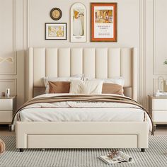 a white bed sitting in a bedroom on top of a rug