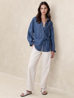 TENCEL Tie-Waist Chambray Shirt | Banana Republic Factory Cotton Tie Waist Tops For Daywear, Belted Blouse For Workwear, Spring Workwear Belted Tops, Casual Button-up Tie Waist Tops, Spring Button-up Tops With Tie Waist, Casual Button-up Tops With Tie Waist, Belted Tops For Fall, Casual Cotton Blouse With Tie Waist, Casual Tie Waist Blouse For Daywear