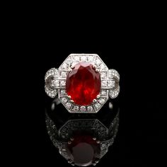 Luxury Open Ruby Ring With Diamonds, Red Center Stone Platinum Ring, Red Platinum Ring With Center Stone, Formal White Gold Ruby Birthstone Ring, Red Oval Diamond Ring In Platinum, Formal Ruby Ring With Platinum Center Stone, Formal Lab-created Ruby Ring With Halo Setting, Oval Red Diamond Ring In Platinum, Formal Platinum Ruby Ring With Center Stone