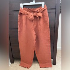 Perfect For Spring, Summer Or Fall! These Stylish Paper Bag Pants Can Be Dressed Up Or Down: For Casual Dinner Date Or Business Casual Work Meeting. -55% Linen -45% Viscose -Burnt Orange/Brown Fabric -Removable Waist Band -Ykk Front Zipper -Come With Spare Button Orange Ankle-length Pants With Pockets, Brown Paperbag Waist Pants With Pockets, Casual Brown Paperbag Waist Pants, Orange Workwear Pants With Pockets, Orange Workwear Bottoms With Pockets, Orange Pants With Pockets For Day Out, Madewell Jumpsuit, Paper Bag Pants, Bag Pants