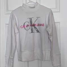 This Sweatshirt Is Really Cozy With A Small Turtleneck. It Has The Calvin Klein Logo In Camo Too! Turtleneck Sweatshirt, Womens Calvin Klein, Camo, Calvin Klein, Top Brands, Color White, Turtle Neck, Womens Tops