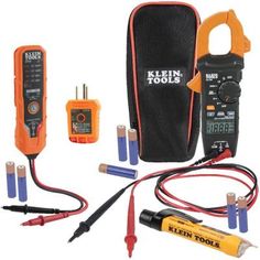 an assortment of electrical tools are shown in this image, including the meter and wires