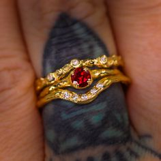 Introducing our elegant Magnolia ring solitaire. We offer this as made to order with a selection of 22 gemstones which can be found here (shown is an example of 14K yellow gold with lab-grown ruby; the pictured ring is sold). Four double-prongs clasp a smaller 4mm round brilliant cut lab-grown ruby. This ring can be customized with diamonds set into the band (not pictured, please see our 22-gemstone made to order Magnolia ring listing for examples of side diamonds). -- Custom?: We can create you Gold Stackable Rings With Ruby Bezel Setting, Promise Ruby Ring In 14k Gold, Ethically Sourced, Lab-created Ruby Promise Ring With Round Band, Red 14k Gold Birthstone Ring For Promise, Yellow Gold Lab-created Ruby Wedding Rings, Yellow Gold Wedding Ring With Lab-created Ruby, Solitaire Lab-created Ruby Ring In Fine Jewelry Style, Solitaire Lab-created Ruby Ring Fine Jewelry, Ruby Stackable Rings With Prong Setting