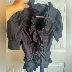 Debbie Shuchat Black Ruffle Shirt Size 14 Black Ruffle On The Front And All The Way Around It Does Run A Little Small But It’s Size 14 Excellent Condition Never Worn But No Tags From Smoke Free / Pet Free Home. Feel Free To Ask Questions Or Make Offers. Bundle Shipping Available A42 Black Puff Sleeve Blouse With Ruffles, Black Casual Top With Ruffled Collar, Black Fitted Blouse With Ruffled Collar, Fall Shirt With Ruffles And Short Sleeves, Fall Short Sleeve Shirt With Ruffles, Fall Ruffled Short Sleeve Shirt, Fitted Tops With Ruffled Collar For Night Out, Black Casual Shirt With Ruffles, Casual Black Puff Sleeve Shirt