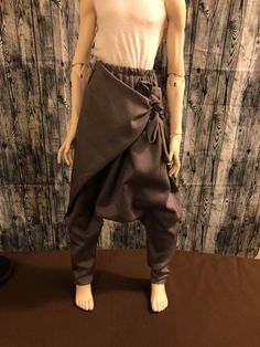 This is a custom made wrap harem pants with an elastic waistband.   These pants fit 40-70 cm bodies. The model in the photo is the Dollstown 17yr male body (70cm) and the Peakswood dandy boy body (60cm) This garment is made-to-order. Estimated delivery time of 7-10  business days.   For other shipping options and combined shipping contact me personally Only the pants are included in sale. Doll is not included. Boy Body, Wrap Pants, Pants Fit, Doll Clothing, Male Body, Dandy, Workout Pants, Doll Toys, Clothing Items