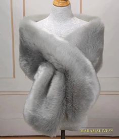 a mannequin with a fur stole on it