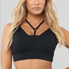 Fashion Nova Black Strappy Sports Bra. This Sports Bra Is Really Supportive And True To Size. Looks Great On And Not Uncomfortable At All. Brand New!! Black Tank Top For Yoga With Bust Support, Black Tank Top With Bust Support For Yoga, Black Tank Top With Medium Bust Support For Yoga, Black Sporty T-back Activewear, Black Stretch T-back Crop Top, Sporty Crop Top With Straps For Gym, Casual Black T-back Activewear, Black Bra-friendly Tank Top For Light Exercise, Black Tank Top For Light Exercise