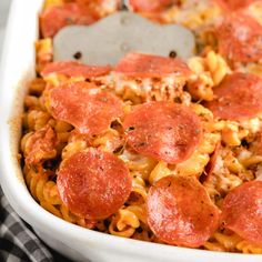 pepperoni and cheese pizza casserole in a white dish