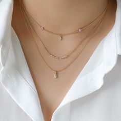 For the lovers of the cherry blossom season, this Blossom collection is for you. This charming necklaces features three blossom flowers, two on the chain and one hanging in the middle. Their pink hue stones glisten subtly in the light. The necklace is easy to layer or a must-have on its own.  Main material: 16k Gold, Rhodium, or Rose Gold Plated on Brass, Pink Cubic Zirconia  Charm Width: 4 mm Necklace Chain Length: 13" inches + 2" extension  Need some jewelry inspiration? Follow us on Instagram Pink Stone Necklace, Blossom Season, Feminine Necklace, Flower Choker Necklace, Cherry Blossom Season, Flower Choker, Jewelry Flower, Floral Jewelry, The Lovers